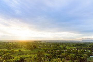 Landscape of cloudy, mountain and forest with sunset in the evening from top view.