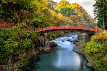 Fototapeta na wymiar Fall in the morning in Nikko// Long exposure with Shinkyo bridge in fall// Tochigi, Japan