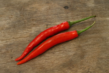 Red chili on a wooden chopping board