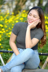 Obraz premium Young Asian Female Making A Decision