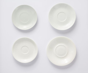 empty plate and saucer on white  background