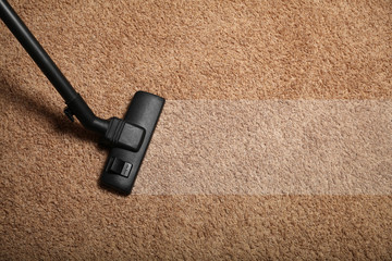 Professional vacuum cleaner. Apartment cleaning service.