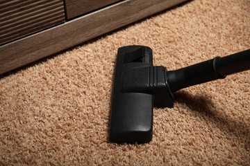 Professional vacuum cleaner. Apartment cleaning service.