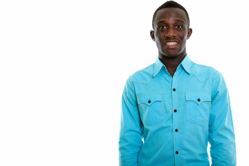 Studio shot of young happy black African man smiling 
