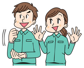 作業着を着た男女グループ