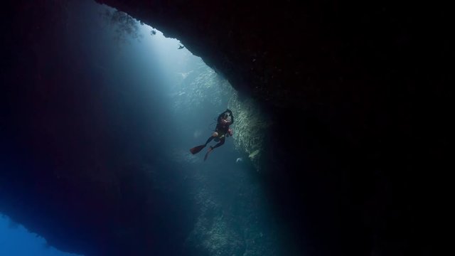 Scuba diver in underwater cavern