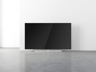 Large smart Tv mockup standing on the floor in empty room