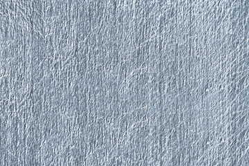 Close up of a blue scratched concrete wall texture
