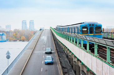 Naklejka premium Train on the metro subway bridge over the river Dnieper in Kiev, Ukraine