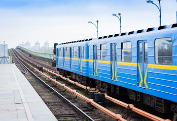 Naklejka premium Train on the metro subway bridge over the river Dnieper in Kiev, Ukraine