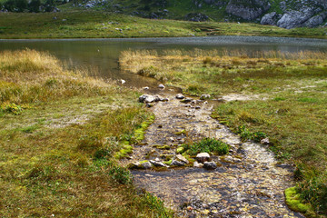 Spring water mountain river and the fantastic petrous creek on North Caucasus. mountain natural landscape photo
