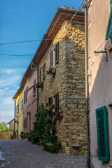 Colorful narrow streets in the medieval town of Guardistallo in Tuscany - 8
