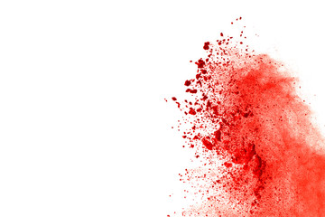 Red powder explosion on white background. Paint Holi.
