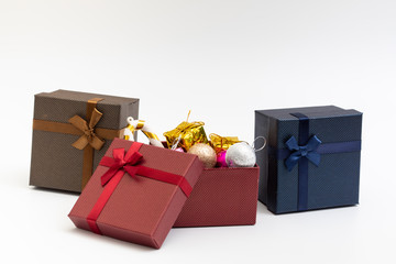 gift present box with color ribbon on white background for christmas birthday special occasion