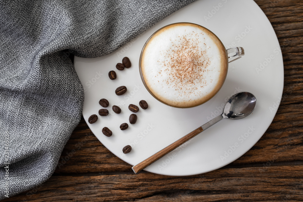 Sticker cappuccino coffee clear cup on wood background for cafe coffee shop menu