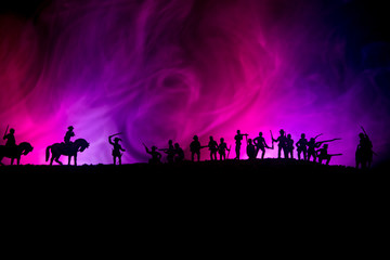 American Civil War Concept. Military silhouettes fighting scene on war fog sky background. Attack scene.
