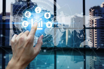 Businessman touch network using currency icon technology with virtual screen icons