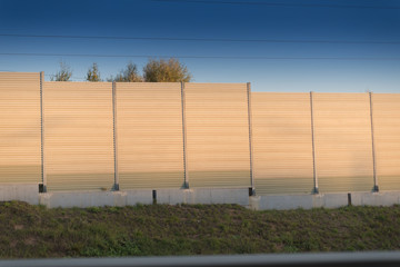 Noise barrier wall on a highway - 231469055