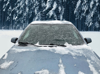 Frozen winter car covered snow, view front window windshield and hood on snowy background