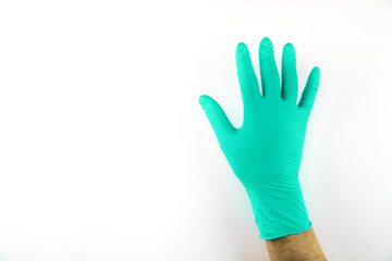 Male hand in medical glove on white background.