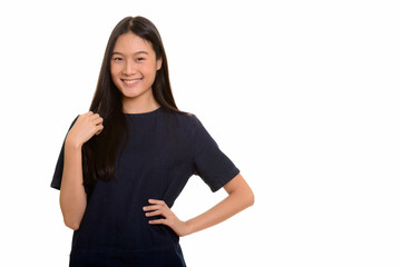 Portrait of young happy Asian teenage girl smiling