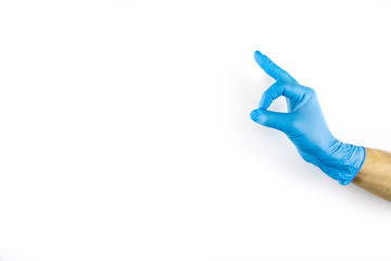 Male hand in medical glove on white background.