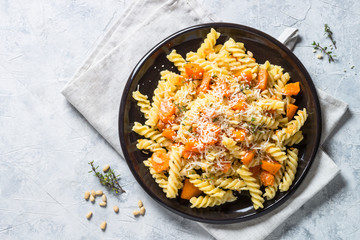 Pumpkin pasta with thyme, cream sauce and parmesan.