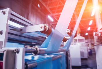 Modern automated production line in factory. Plastic bag manufacturing process