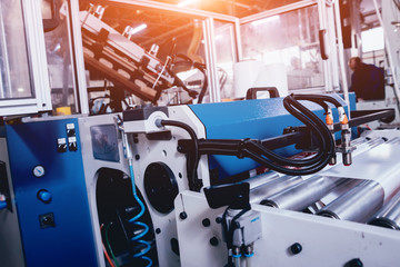 Modern automated production line in factory. Plastic bag manufacturing process