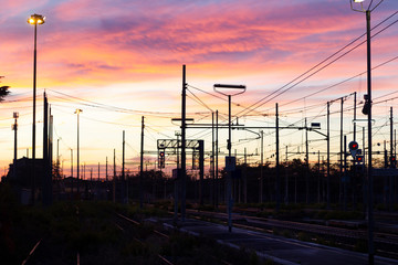 Fototapeta na wymiar small Italian train station at sunrise
