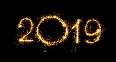 Number 2019 written sparklers isolated on black background