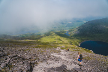 Man and woman on the trail to mount Carrauntoohil