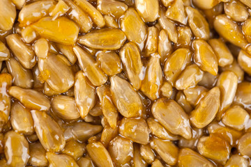 Close-up fragment of a gozinaki confection sweets, texture