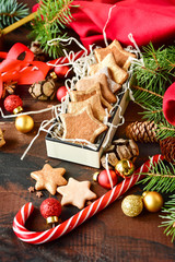 christmas cookies in the shape of stars decor gold, with candy,  pine cones, and  Christmas balls yellow and red, Christmas 2019, new year is 2019, selective focus