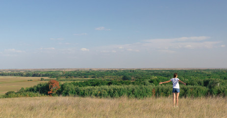 girl in the field concept of freedom