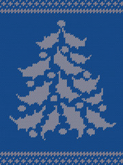 blue knitted pattern with a Christmas tree