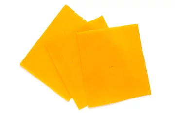 Fotobehang Cheddar cheese slice isolated on the white background. © gitusik