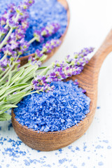 Fototapeta na wymiar Essential lavender salt with flowers top view.