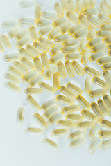 Close up of capsules Omega 3 on white background
