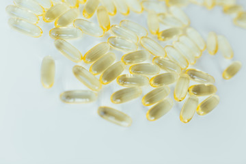 Close up of capsules Omega 3 on white background