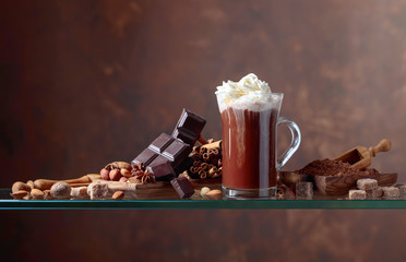 Cocoa with cream,  chocolate pieces and various spices.