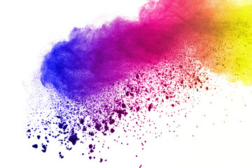 Fototapeta premium Freeze motion of colored powder explosions isolated on white background.
