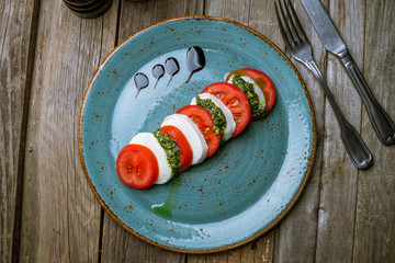 Caprese salad with mozzarella and tomato