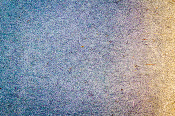Blue and yellow handmade craft paper texture background