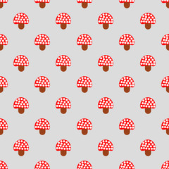 Seamless pattern with cute red fly agaric amanita mushrooms. Abstract vector background. Simple style.