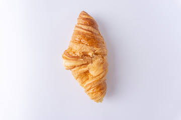 Plain croissant on white background