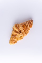 Plain croissant on white background