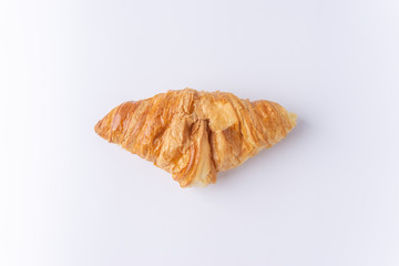 Plain croissant on white background