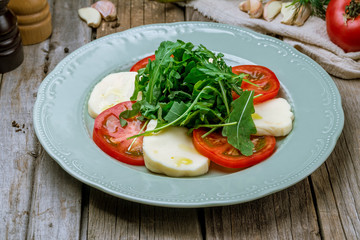 Caprese salad with mozzarella and tomato