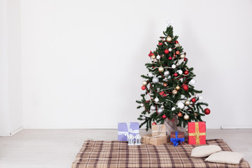 Christmas tree with presents on a white background for the new year